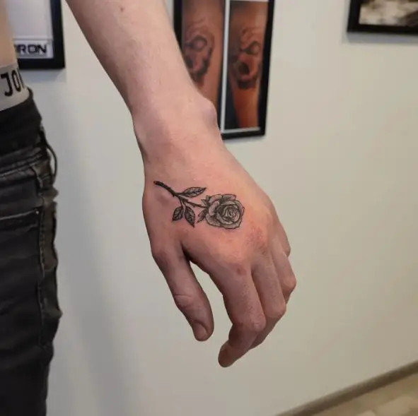 Small Black Rose Hand Tattoo