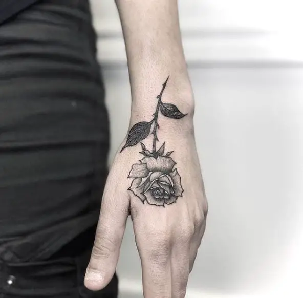 Grey Shaded Rose Hand Tattoo
