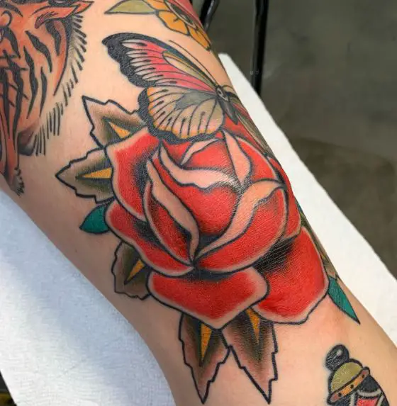 Colored Butterfly on Fiery Red Rose Tattoo