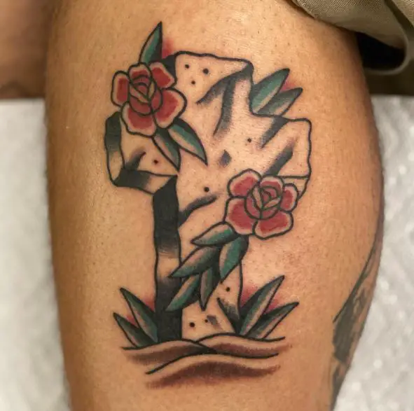 Red Roses around Cross Stone Tattoo