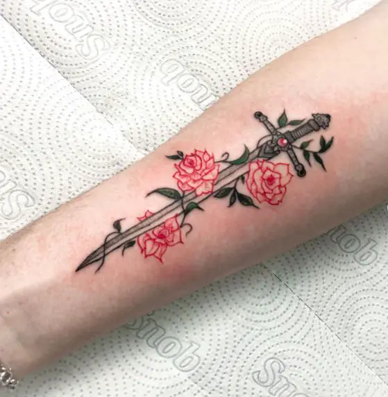 Red Roses around Dagger Tattoo