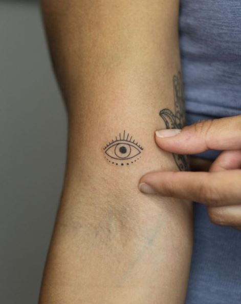 Small Evil Eye Biceps Tattoo