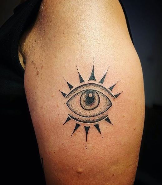 Black and Grey Evil Eye Arm Tattoo