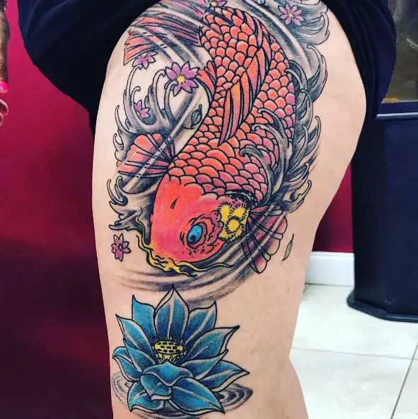 Blue Lotus Flower and Red Koi Fish Thigh Tattoo