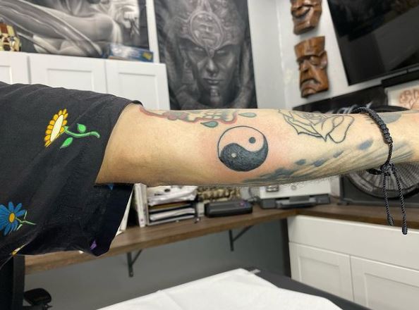 Yin Yang Elbow Tattoo