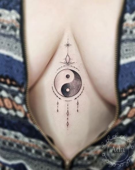 Ornaments and Minimalistic Yin Yang Chest Tattoo