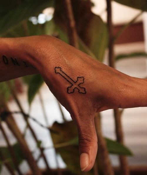 Miniature Cross Hand Tattoo