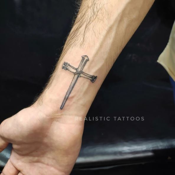 Shaded Cross Wrist Tattoo