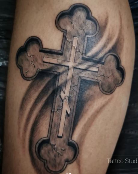 Shaded Black and Grey Cross Calf Muscle Tattoo