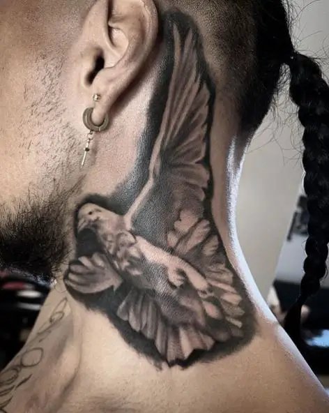 Black and Grey Dove behind Ear Tattoo