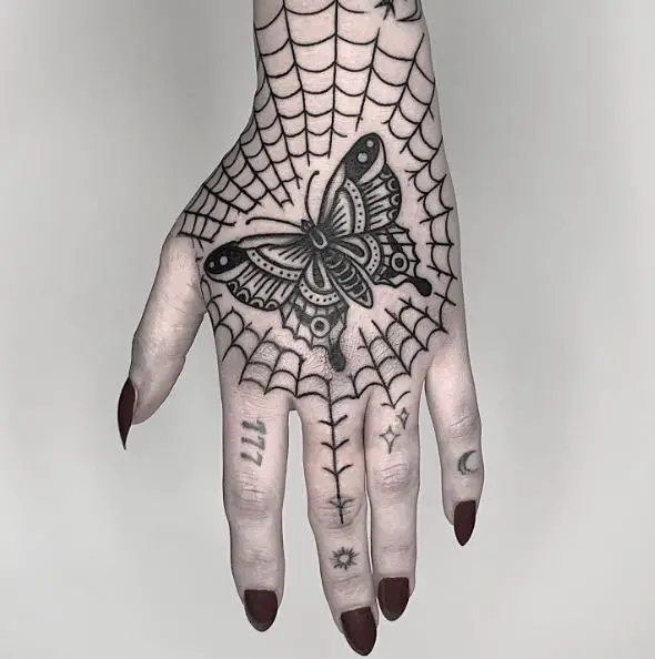 Butterfly and Spider Web Hand Tattoo