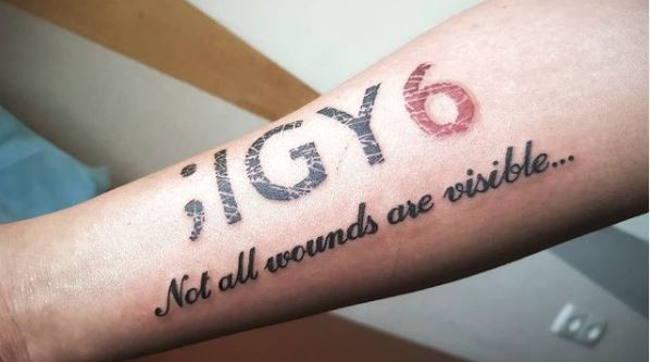 Semicolon IGY6 with Message Arm Tattoo