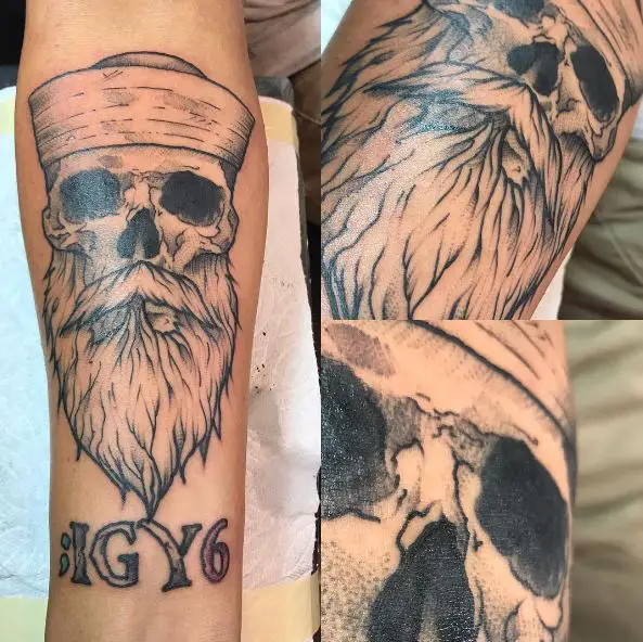 Skull with Navy Hat and IGY6 Arm Tattoo