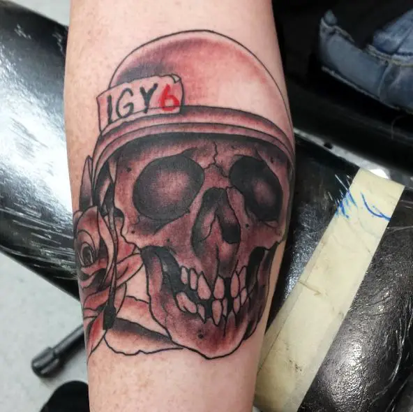 Skull with Helmet and IGY6 Arm Tattoo