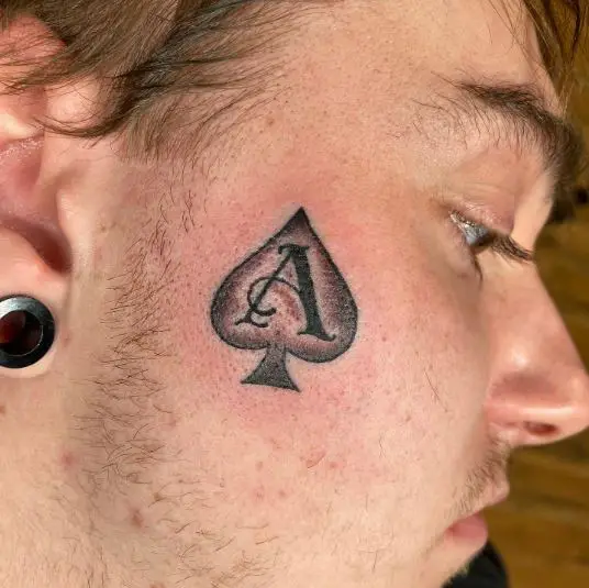 Ace of spades face tattoo