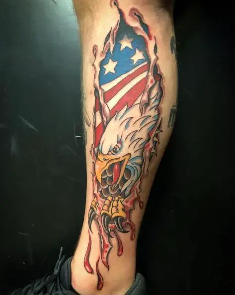 Tattoo of an Eagle Ripping of the USA Flag