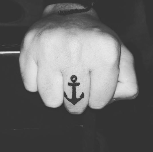 Anchor tattoo on finger