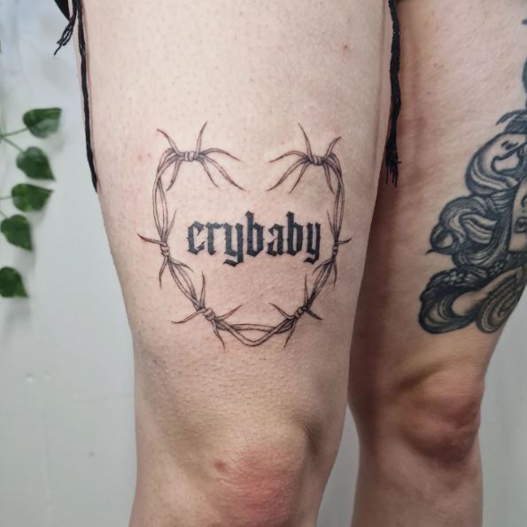 Barbed Wire With A Word Thigh Tattoo