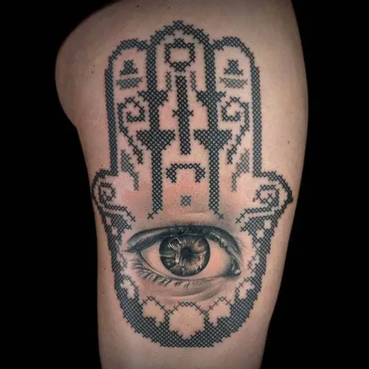 Black Cross Stitch Eye Thigh Tattoo