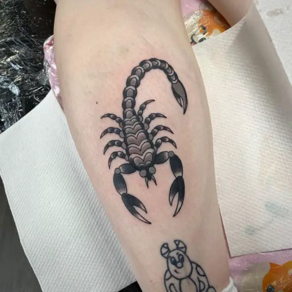 Black Ink Scorpion Tattoo On Calf