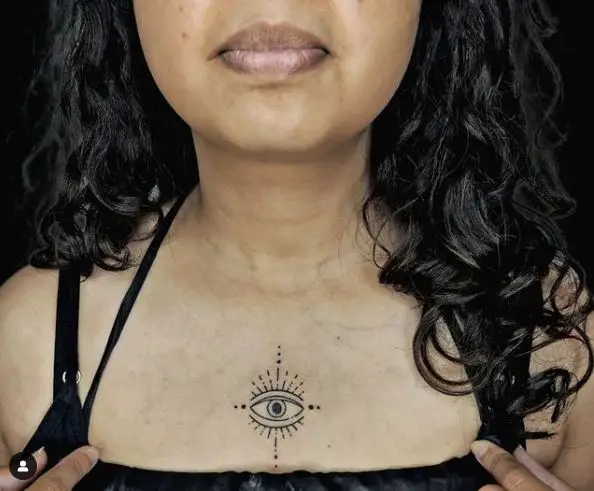 Evil Eye Chest Tattoo with Black Lines