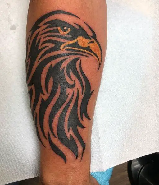 Black Tribal Eagle with Yellow Beak Tattoo
