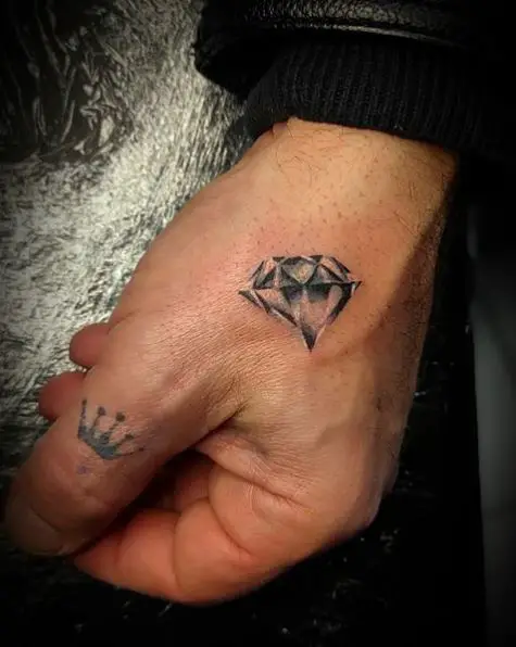 Black and White Diamond Hand Tattoo
