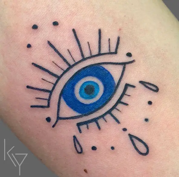 Blue Evil Eye Tattoo with Black Dots and Drops