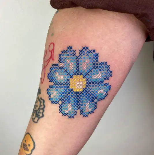 Blue and Yellow Cross stitch flower