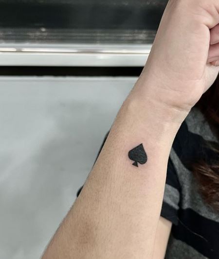 Bold Ink Spade Tattoo on Hands