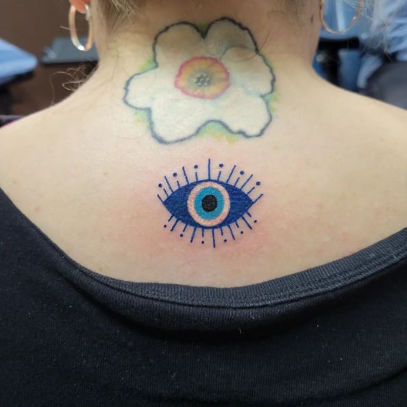 Bold Inked Evil Eye Back Tattoo
