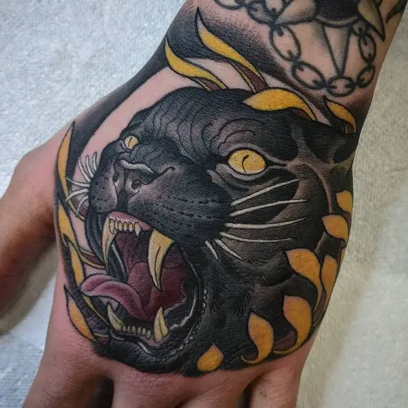 Bold Inked Roaring Panther Hand Tattoo