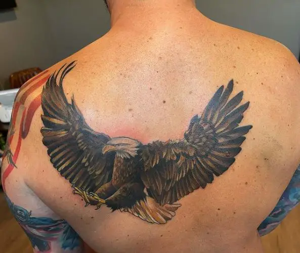 Brown Colored Flying Eagle Tattoo