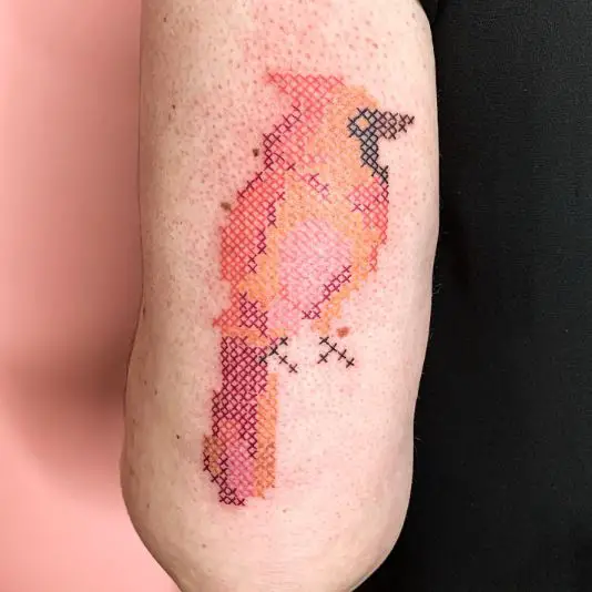 Cross stitch cardinal tattoo