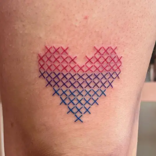 Cross stitch heart tattoo in the bi-flag colours