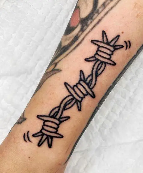 Dark and Thick Lined Barbed Wire Hand Tattoo