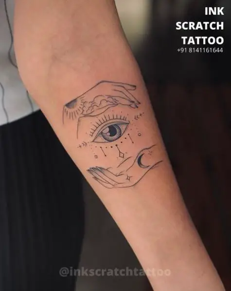 Evil Eye with Nature Hands Forearm Tattoo