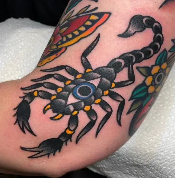 Evil eye scorpion tattoo