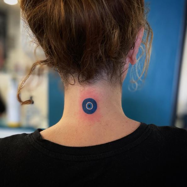 Minimalistic Evil Eye Neck Tattoo