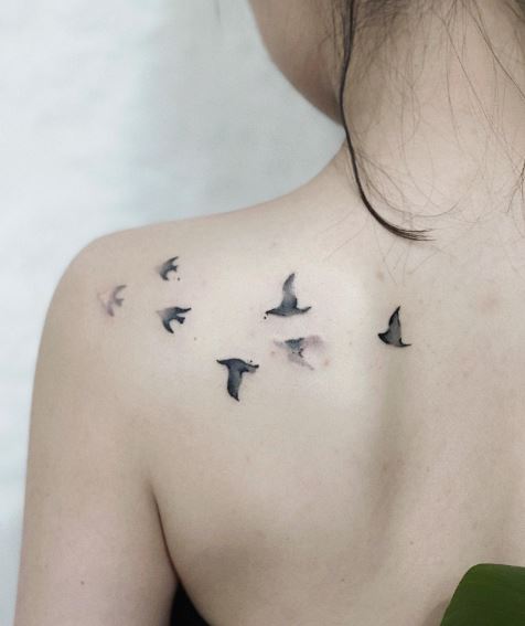 Flying Swallows Shoulder Tattoo