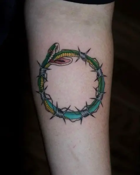 Green Snake Tied With Barbed Wire Tattoo