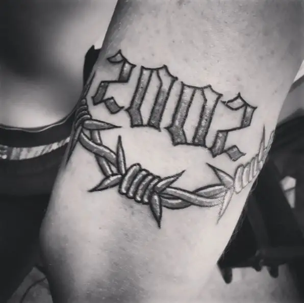 Grey Barbed Wire with Year Tattoo