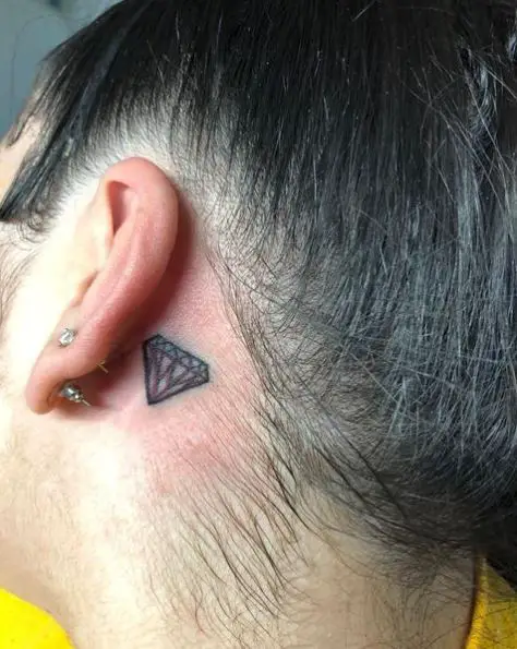 Lil diamond tattoo behind the ears