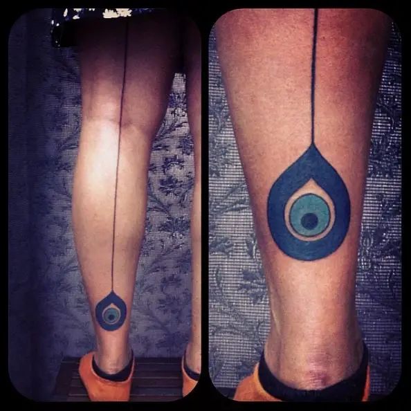 Longest Line Tear Drop Evil Eye Leg Tattoo