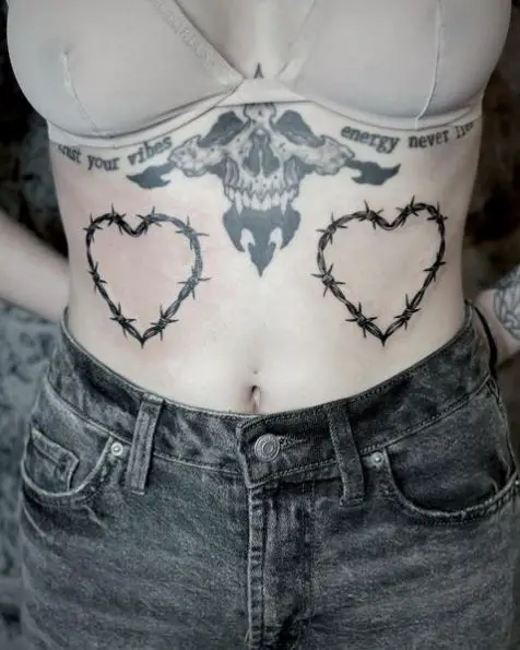 Matching barbed wire hearts tattoo