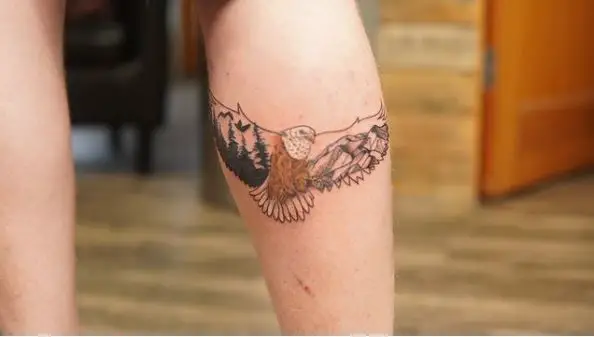 Eagle Tattoo with Nature Scene in the Wings