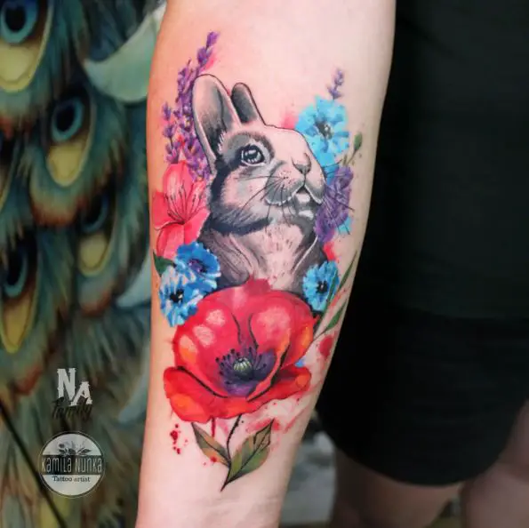 Rabbit with watercolor flowers tattoo