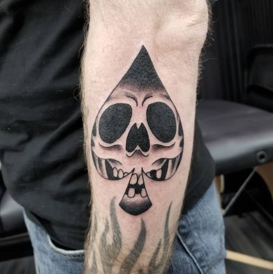 Rad Skull Inside a Spade Tattoo