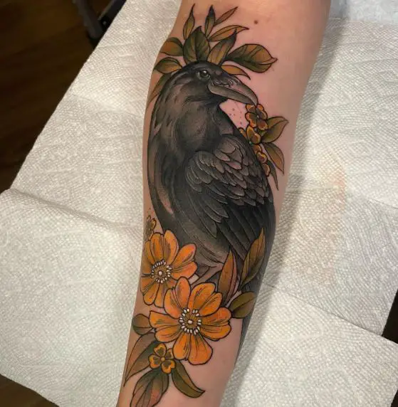 Raven and Yellow Flowers Forearm Tattoo
