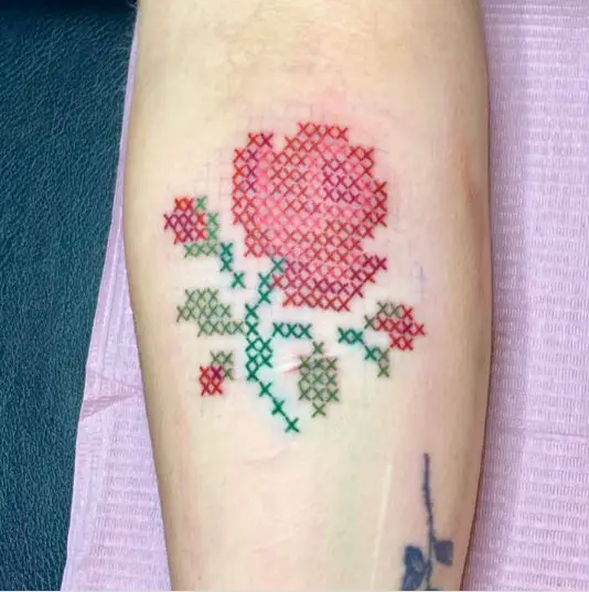 Red Cross Stitch Flower Tattoo